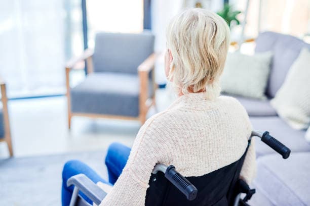 Participant using a wheelchair at home